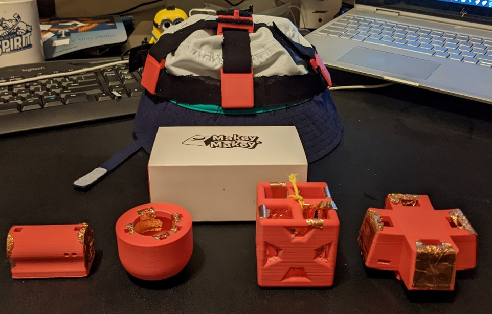The Makey Makey alongside customized 3D printed tilt sensors.